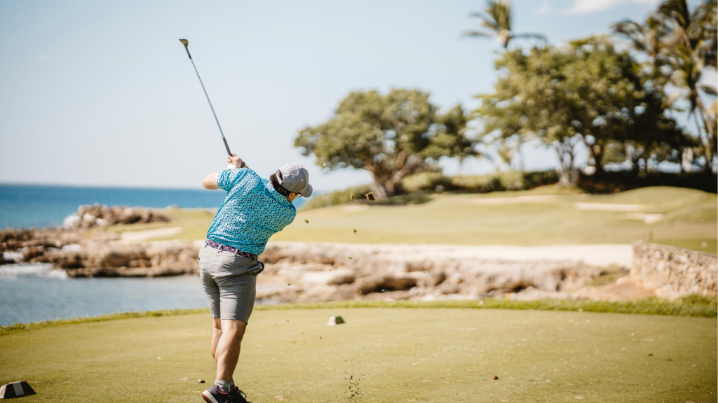 Man Playing On A Golf Course On The Big Island
